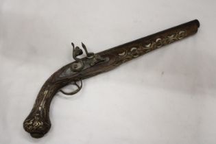 A VINTAGE PISTOL WITH MOTHER OF PEARL AND BRASS INLAY