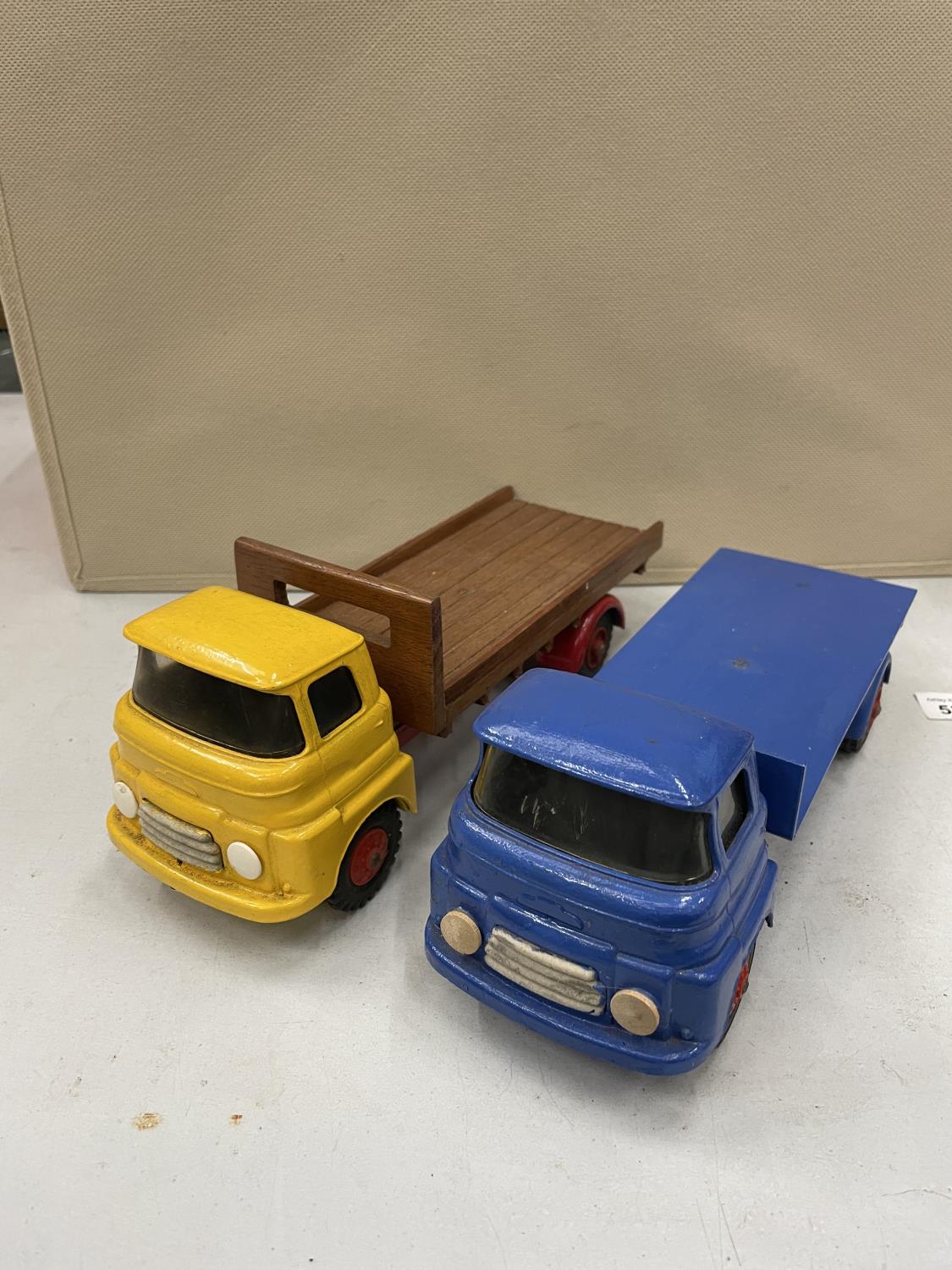 TWO TRIANG MODEL FLATBED TRUCKS, RESTORED FROM ORIGNAL