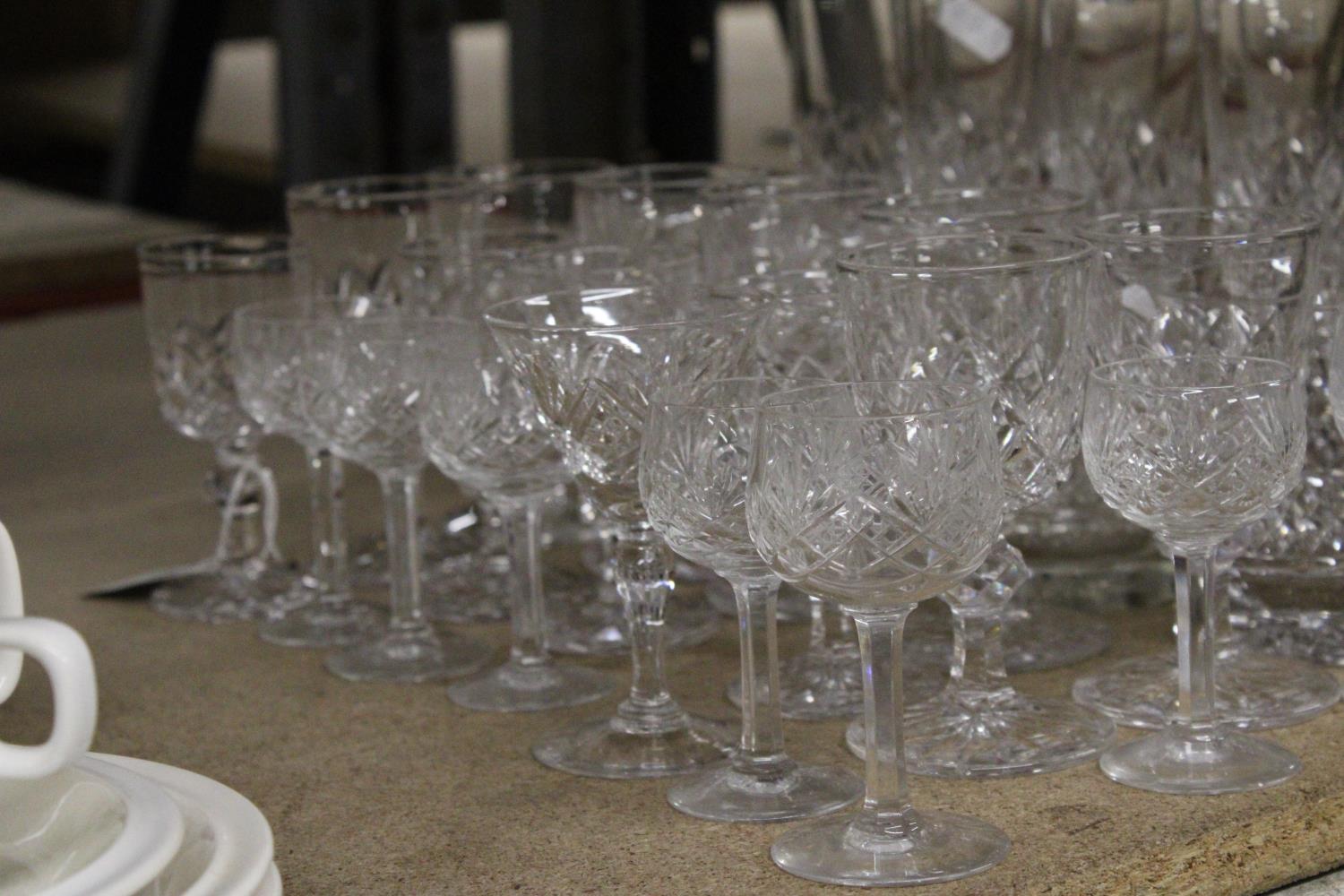 A QUANTITY OF CUT GLASS GLASSES TO INCLUDE CHAMPAGNE FLUTES, WHISKY, WINE, SHERRY, PORT, ETC - Image 2 of 5