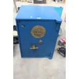 A FIRE PROOF SAFE WITH BRASS PLAQUE BEARING THE NAME MILNERS LONDON, KEY IN THE OFFICE