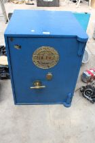 A FIRE PROOF SAFE WITH BRASS PLAQUE BEARING THE NAME MILNERS LONDON, KEY IN THE OFFICE