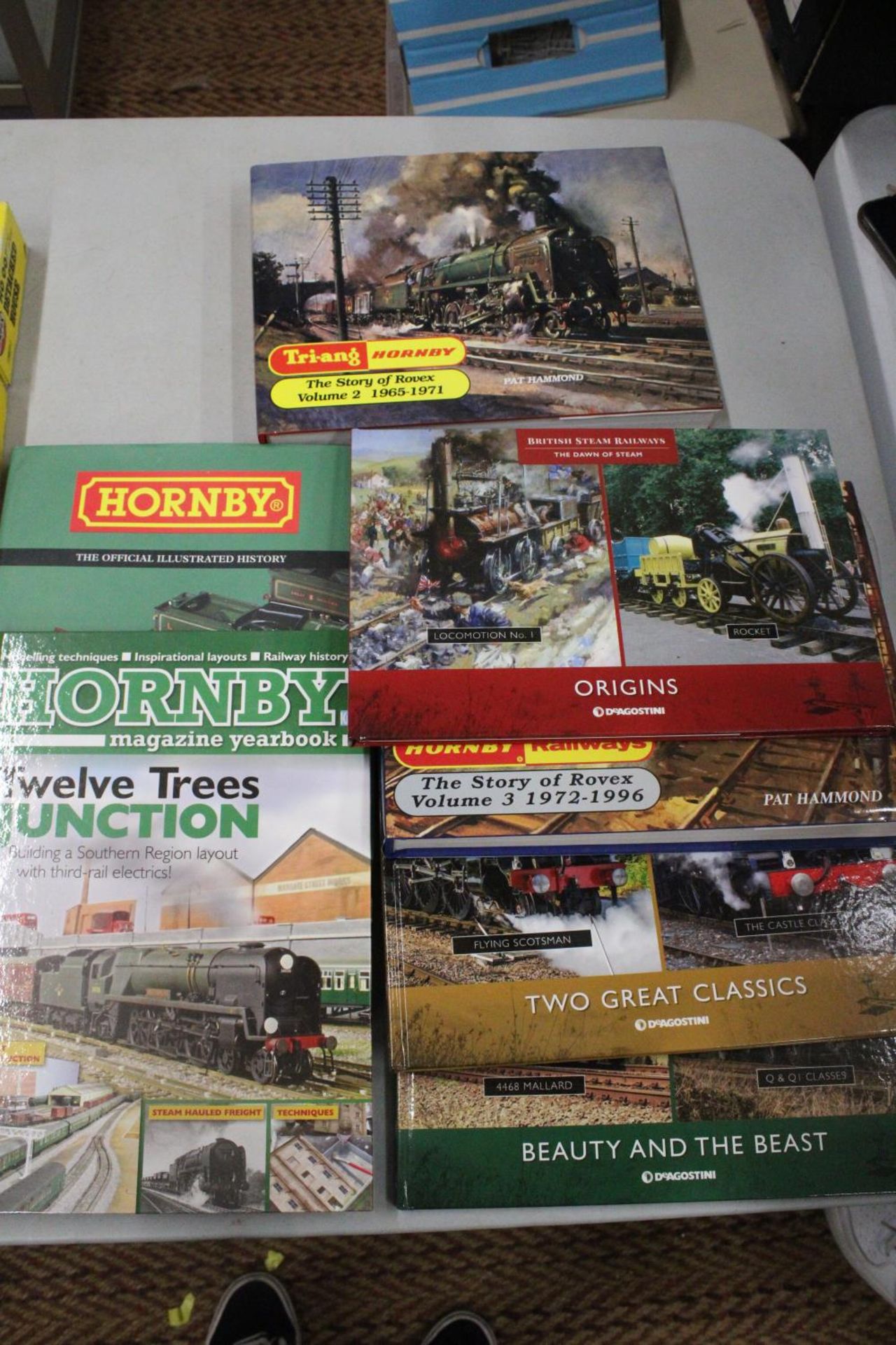 SEVEN HARDBACK RAILWAY BOOKS TO INCLUDE MAINLY HORNBY