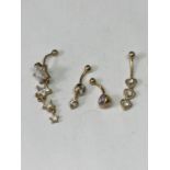FOUR 9 CARAT GOLD BELLY BUTTON BARS