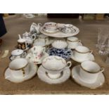 SIX LIMOGES CUPS AND SAUCERS, WHITE WITH GILT RIMS AND HANDLES, A FOOTED CAKE PLATE, VINTAGE ROYAL