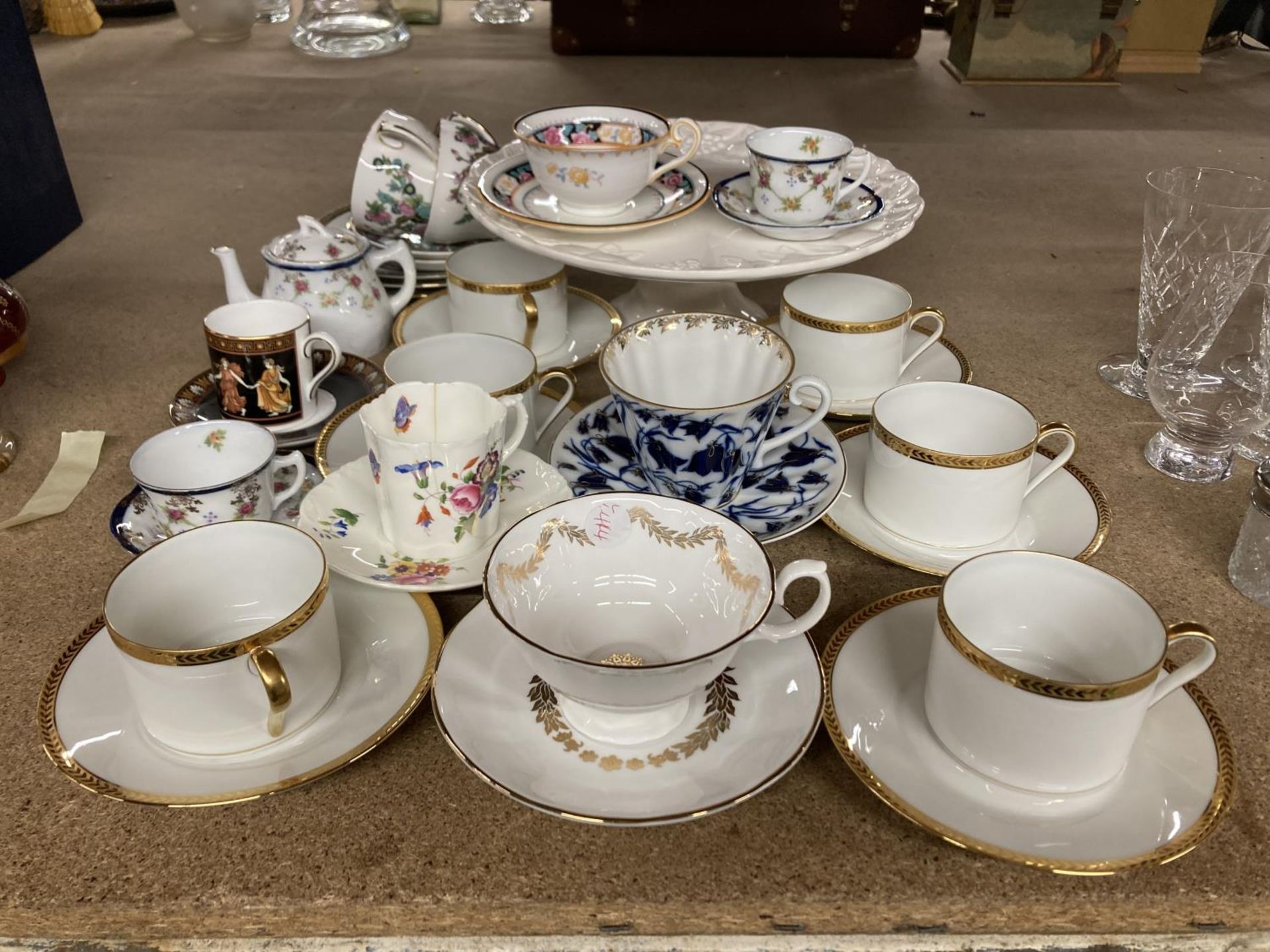 SIX LIMOGES CUPS AND SAUCERS, WHITE WITH GILT RIMS AND HANDLES, A FOOTED CAKE PLATE, VINTAGE ROYAL