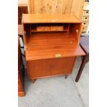 A RETRO TEAK BUREAU WITH DRAWER AND CUPBOARDS TO BASE, 30" WIDE