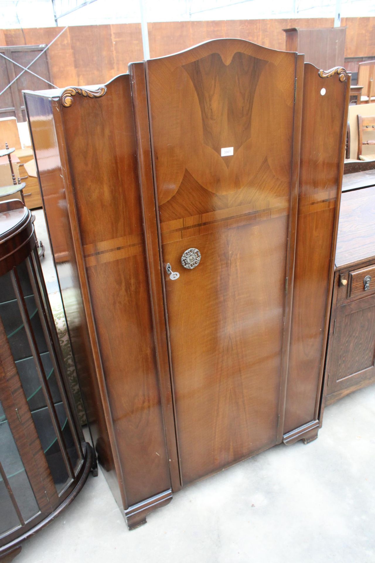 A TRUCRFT WALNUT SINGLE WARDROBE