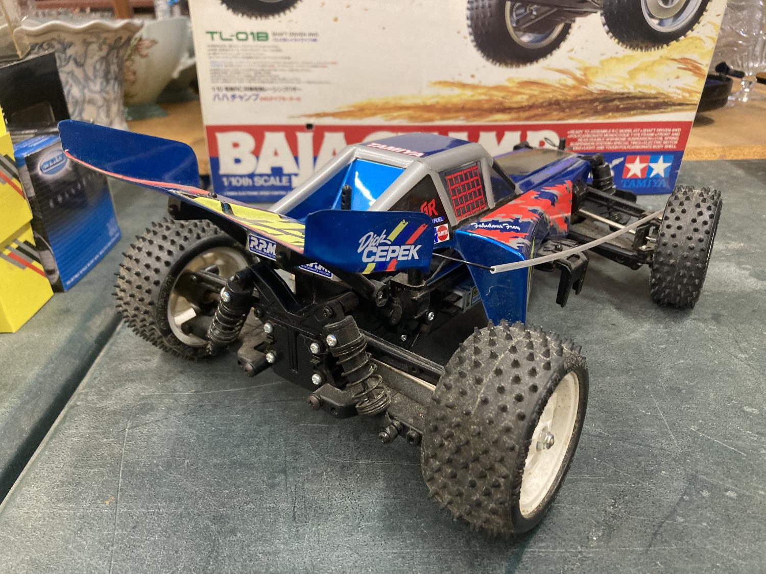 A TAMIYA BAJA CHAMP 1/10TH SCALE R/C 4WD HIGH PERFORMANCE OFF ROAD RACER (NO CONTROLLER PRESENT) - Image 7 of 8