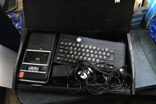 A SINCLAIR ZX SPECTRUM + AND A RADIO SHACK COMPUTER CASSETTE RECORDER IN A CASE