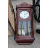 A MAHOGANY CASED WESTMINISTER CHIMING WALL CLOCK