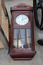 A MAHOGANY CASED WESTMINISTER CHIMING WALL CLOCK