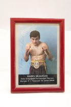 A SIGNED FRAMED PHOTOGRAPH OF BARRY McGUIGAN, PLUS A JOHN CONTEH SIGNATURE