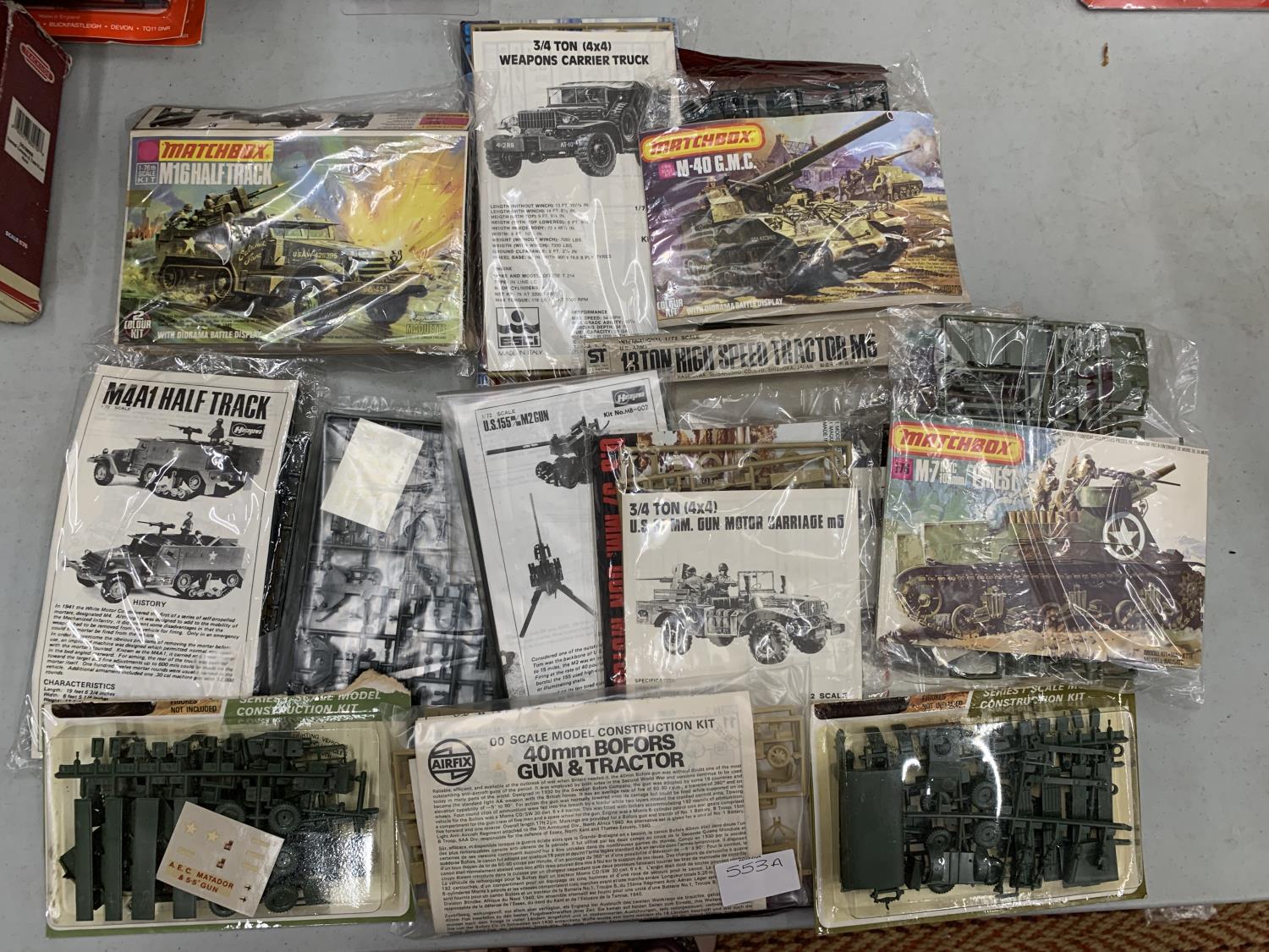 A LARGE COLLECTION OF MILITARY VEHICLE MODEL KITS TO INCLUDE MATCHBOX, AIRFIX AND OTHERS