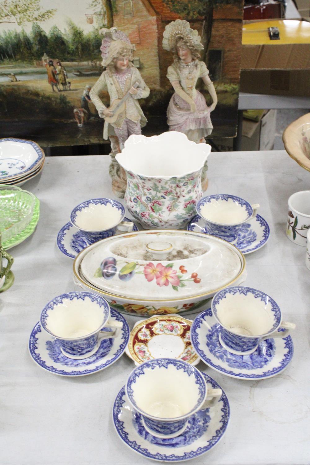 FIVE GEORGE JONES AND SONS, 'CRESCENT' BLUE AND WHITE CUPS AND SAUCERS, A FLORAL PLANTER, A PAIR