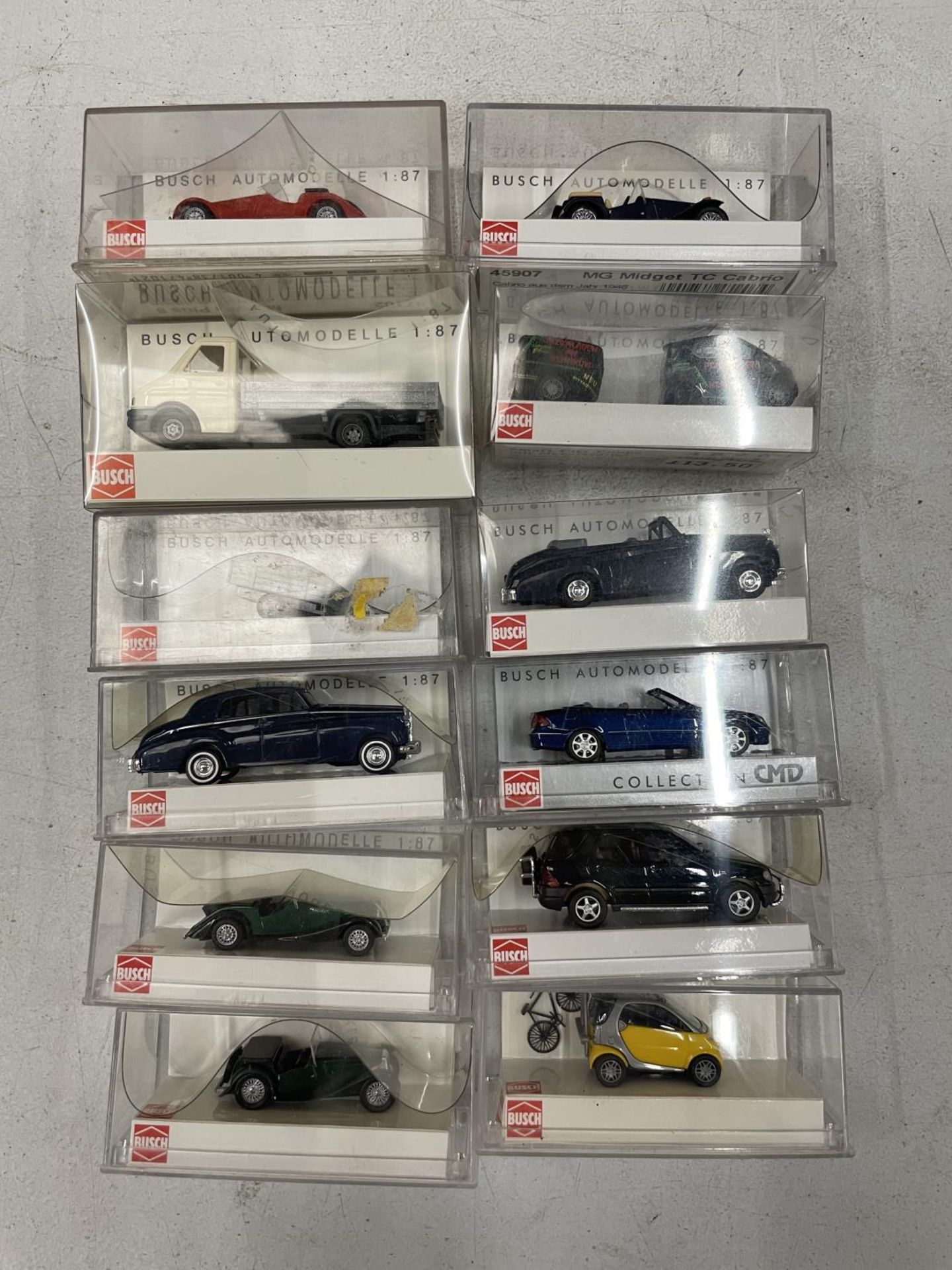 TWELVE BOXED BUSCH VEHICLES 1:87 SCALE