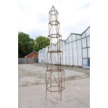 A GRADUATED HEXAGON TALL GARDEN OBELISK (H:217CM)