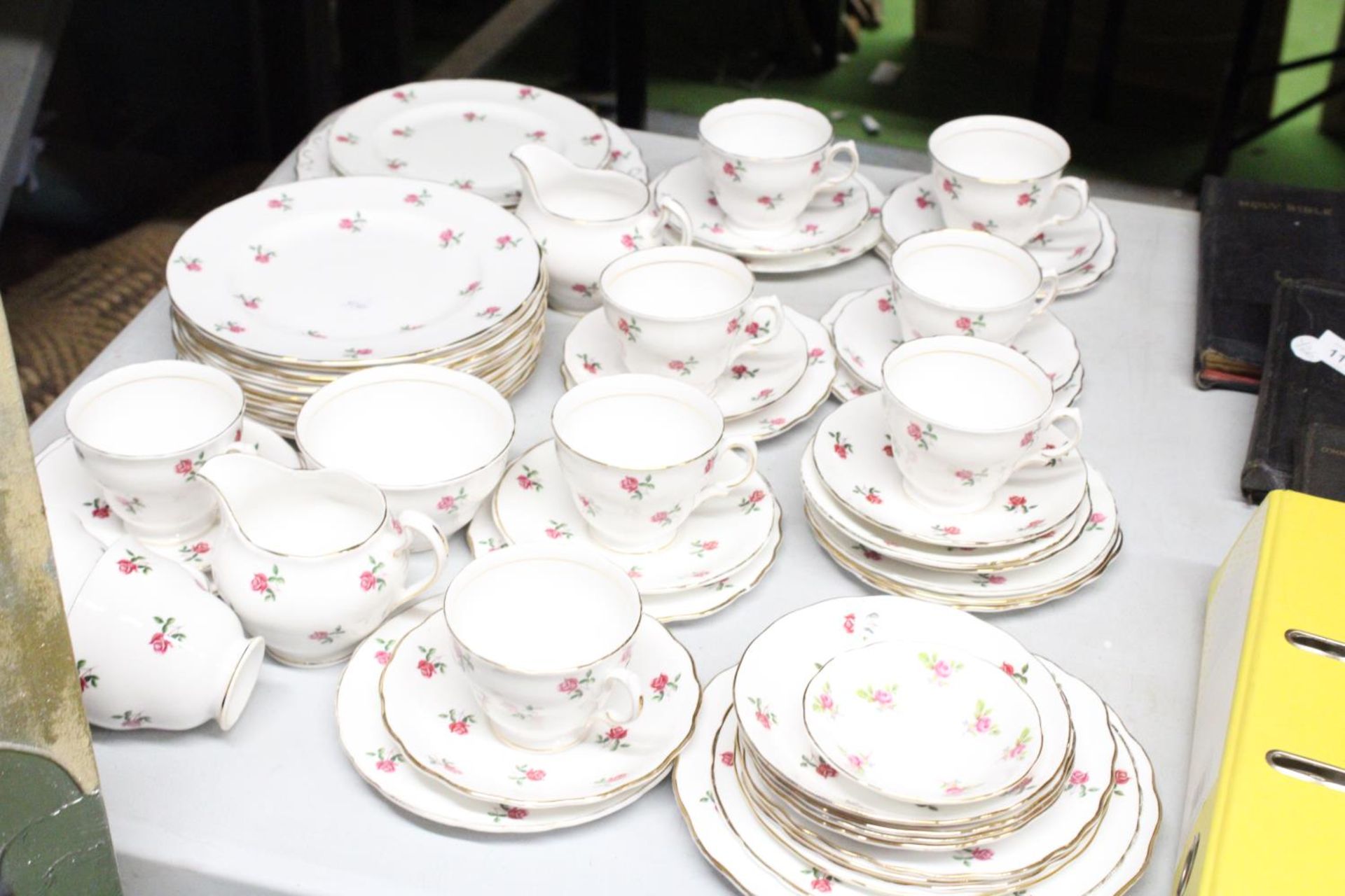 A VINTAGE COLCLOUGH CHINA TEASET, WITH ROSE PATTERN TO INCLUDE PLATES, CREAM JUGS, A SUGAR BOWL,