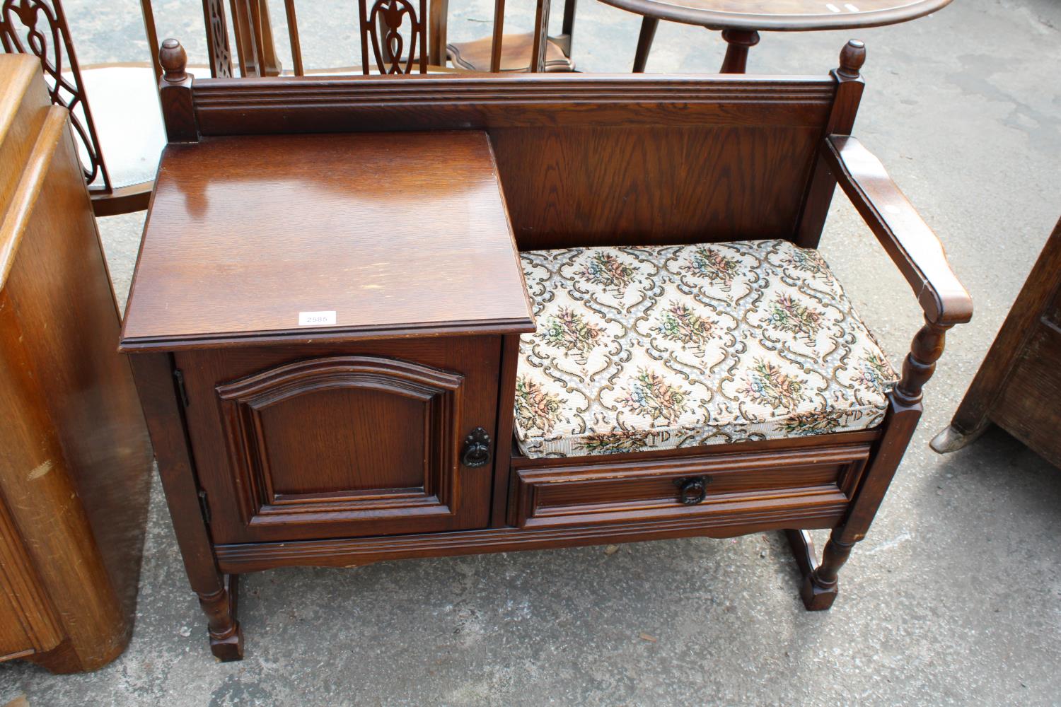 AN OAK TELEPHONE TABLE/SEAT