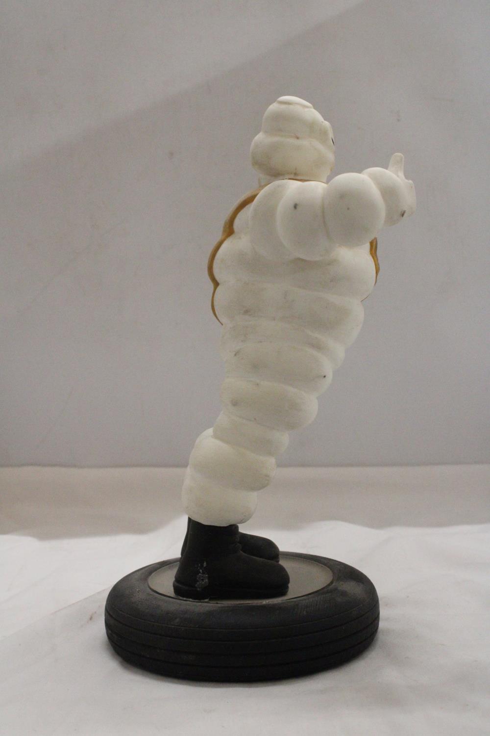 A VINTAGE ORIGINAL MICHELIN MAN ON TYRE APPROXIMATELY 33 CM HIGH - Image 5 of 5