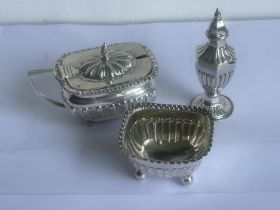 A HALLMARKED BIRMINGHAM SILVER CRUET SET (SALT LACKING LINER) GROSS WEIGHT WITHOUT MUSTARD POT LINER