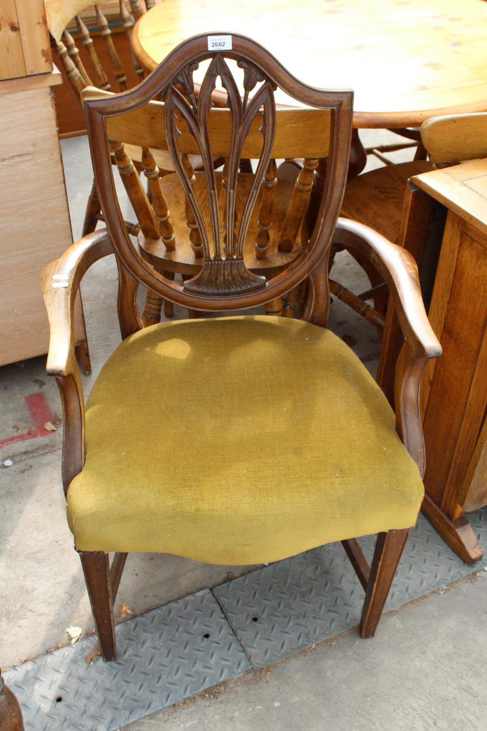 A MAHOGANY HEPPLEWHITE STYLE CARVER CHAIR