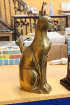 A HEAVY BRASS EGYPTIAN GOD CAT "BAST" WEIGHING OVER 4 KILO - 16 INCH IN HEIGHT