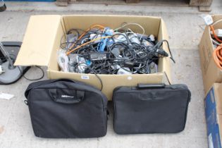 TWO LAPTOP BAGS AND AN ASSORTMENT OF ELECTRICAL CABLES