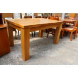A MODERN OAK EXTENDING DINING TABLE 55" X 36" (LEAF 15.5) ON SQUARE LEGS