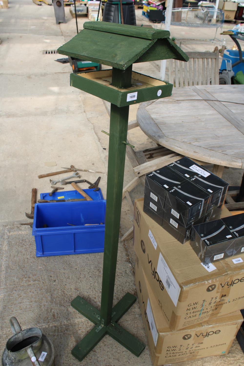 A SMALL WOODEN BIRD TABLE AND A WOODEN SMALL BIRD BOX