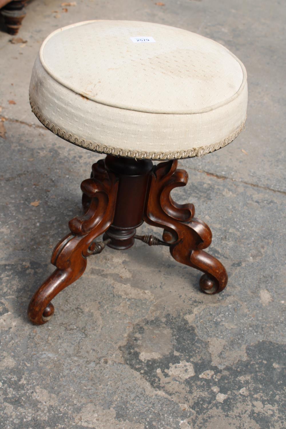 A VICTORIAN LOW WALNUT STOOL WITH UPHOLSTERED TOP