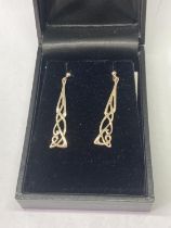 A PAIR OF ARCHIBALD KNOX SILVER EARRINGS IN A PRESENTATION BOX