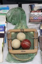 A VINTAGE DUNLOP BADMINTON RACKET TOGETHER WITH THREE VINTAGE BALLS