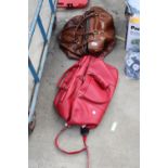 TWO LEATHER HOLDALLS