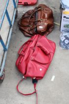 TWO LEATHER HOLDALLS