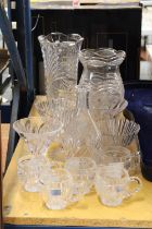 A COLLECTION OF GLASSWARE TO INCLUDE VASES, CUPS, BOWLS, ETC