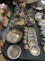 A COLLECTION OF SILVER PLATE TO INCLUDE A TEASET WITH GALLERIED TRAY, COASTERS, BOWLS, EGG CUPS,
