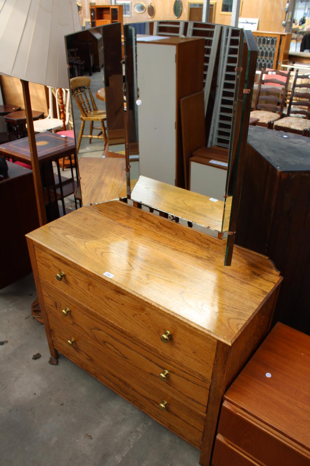 A MID 20TH CENTURY OAK THREE DRAWER DRESSING CHEST WITH TRIPLE MIRROR, 39" WIDE - Image 2 of 3