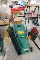 A QUALCAST POWER-TRAK 34 ELECTRIC LAWN MOWER AND A TESCO ELECTRIC LEAF BLOWER