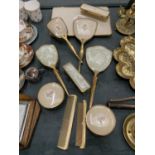 A COLLECTION OF DRESSING TABLE BRUSHES WITH FLORAL DECORATION TO THE BACKS PLUS A TRAY, HAND MIRRORS