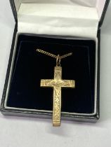 A GOLD PLATED CROSS AND CHAIN IN A PRESENTATION BOX