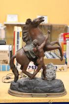 A HEAVY FRENCH METAL HORSE AND MAN ON WOODEN BASE "OFFERT PAR LA FEDERATION 1933