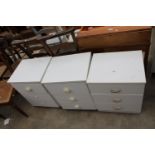 THREE VARIOUS MODERN WHITE BEDSIDE CHESTS