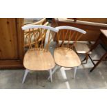 A PAIR OF ERCOL ELM, BEECH AND PAINTED CANDLESTICK KITCHEN CHAIRS