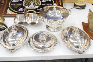 A QUANTITY OF SILVER PLATED ITEMS TO INCLUDE A SOUP TUREEN WITH LADEL, THREE LIDDED SERVING DISHES