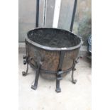 A LARGE VINTAGE AND DECORATIVE COPPER PLANTER WITH WROUGHT IRON STAND (D:53CM)