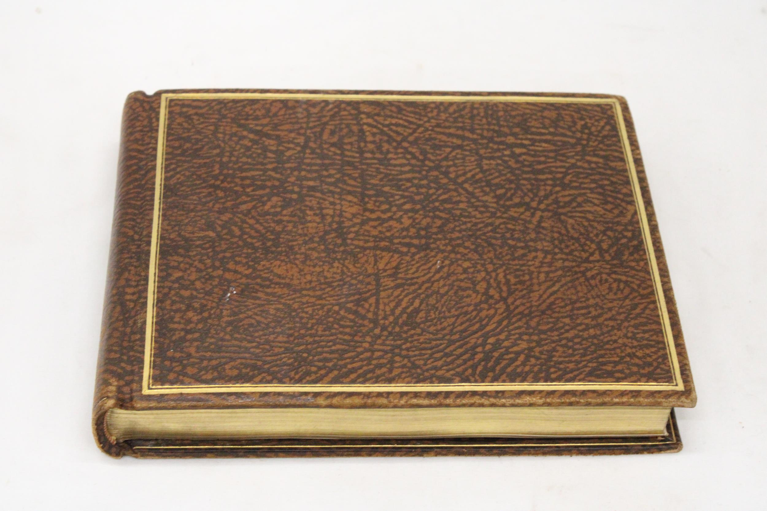 A VINTAGE LEATHER BOUND AUTOGRAPH BOOK FROM THE 1940'S WITH MOSTLY RELIGIOUS ENTRIES