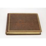 A VINTAGE LEATHER BOUND AUTOGRAPH BOOK FROM THE 1940'S WITH MOSTLY RELIGIOUS ENTRIES