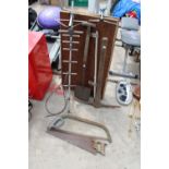 AN ASSORTMENT OF ITEMS TO INCLUDE A PASTING TABLE, SAWS AND A SPADE ETC