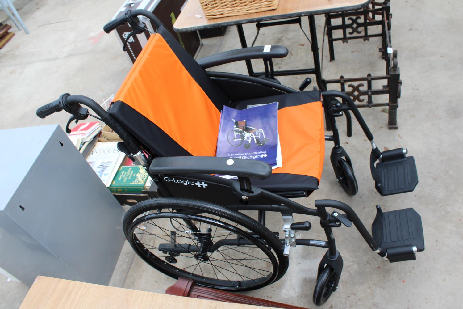 AN AS NEW EXCEL G-LOGIC FOLDING WHEEL CHAIR - Image 2 of 3