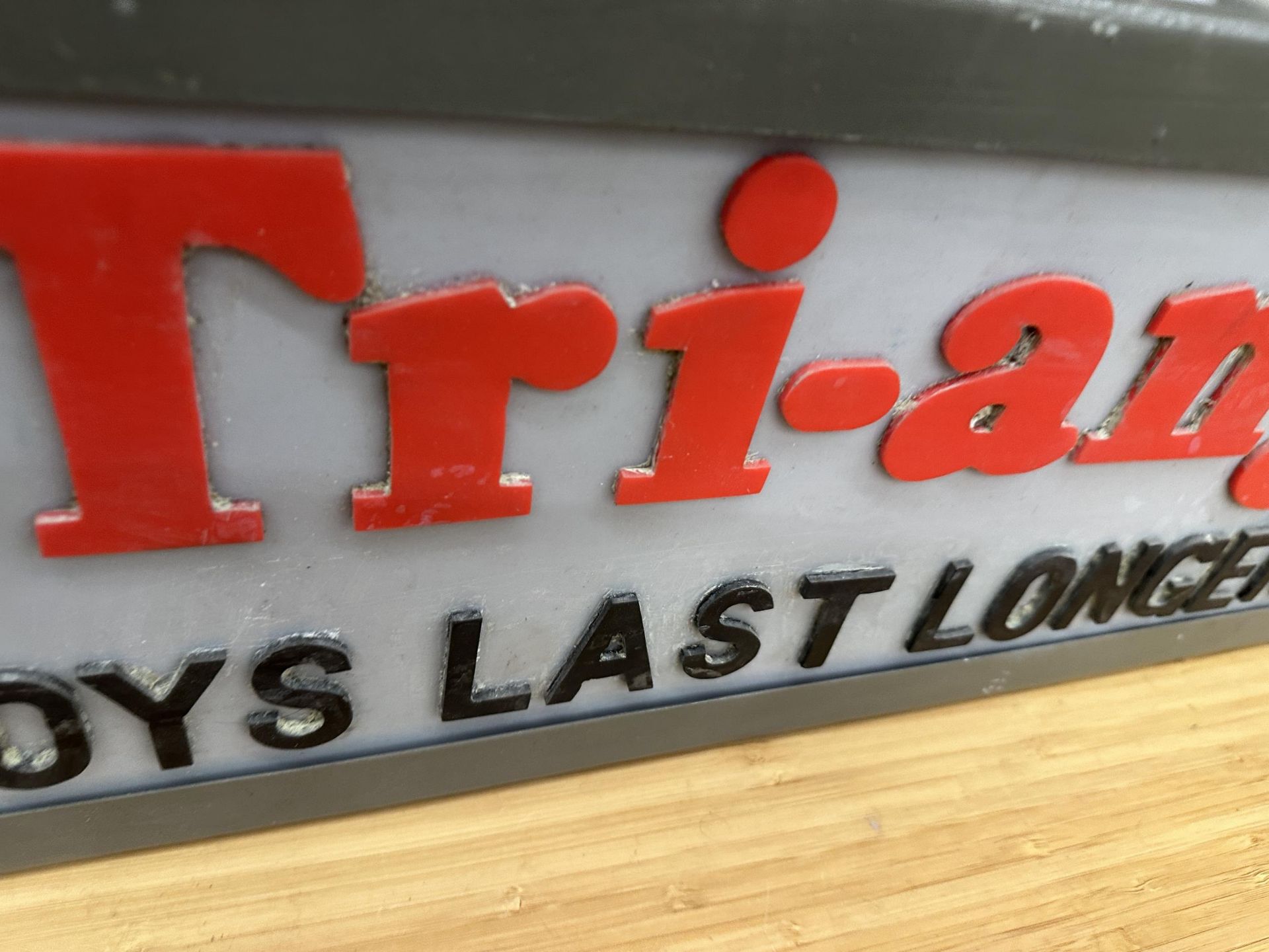 AN ILLUMINATED TRI-ANG TOYS LAST LONGER SIGN (L:50CM H:21CM) - Image 2 of 3